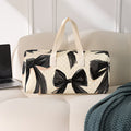 Black bow pattern fashionable weekend bag